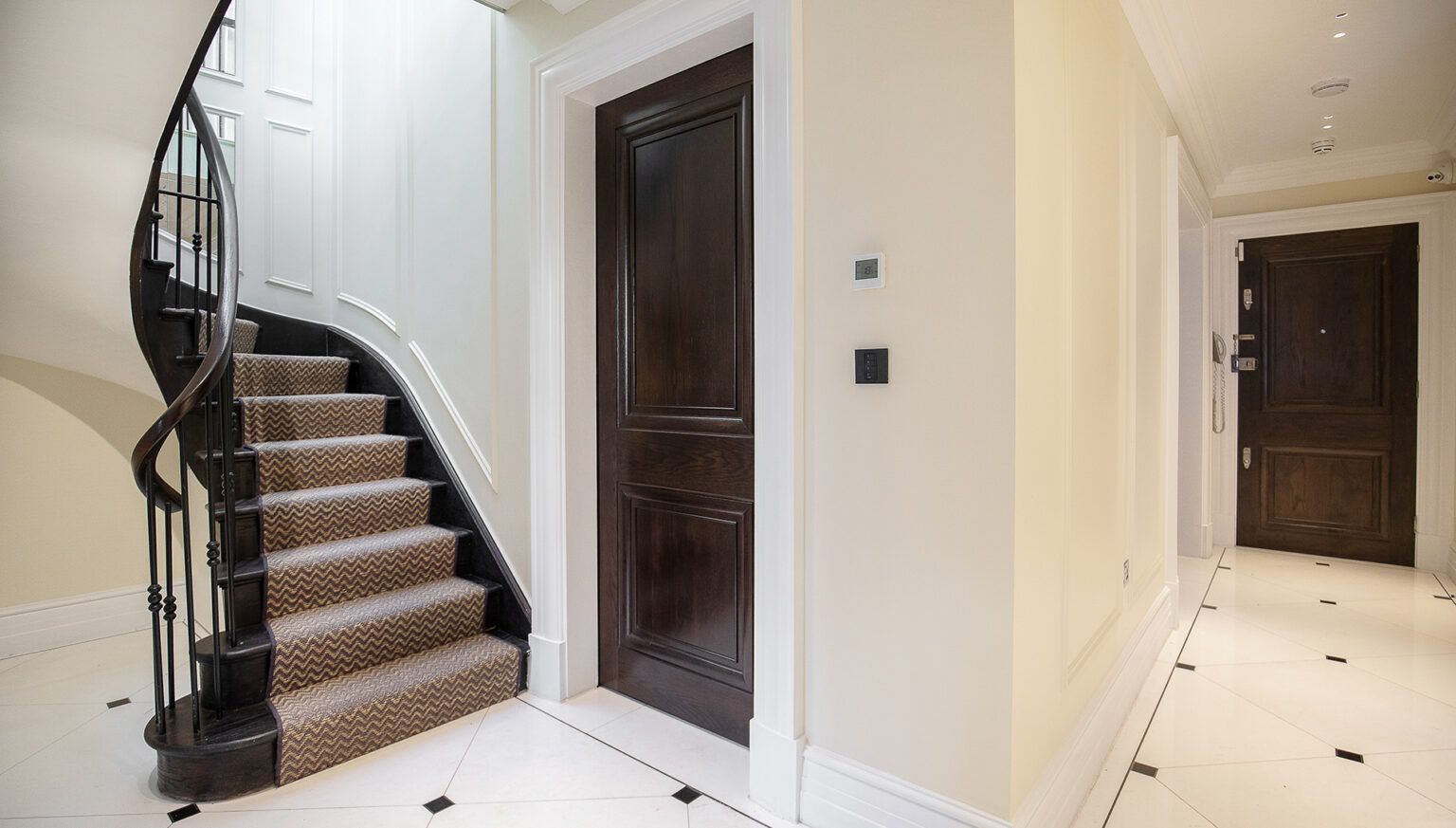 Light and airy stairs and hallway in a house