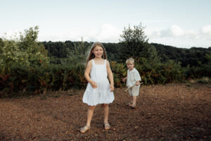 Girl and Boy playing with bubbles