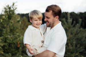 Father and son spinning around